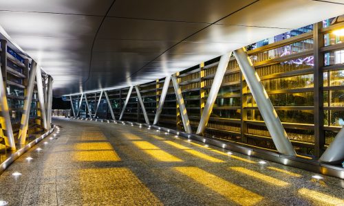 Empty modern pedestrian pathway at night